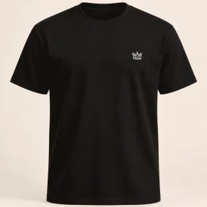 Illustrative black Official Lawnland T-shirt with a small white Lawn crown on the chest, on a warm ivory background
