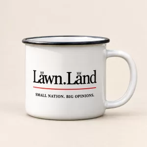 Illustrative white enamel Lawnland mug on the same warm ivory background as the Diplomatic Backpack